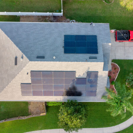 overhead view of a Lake Mary home with solar panels on both sides of the roof
