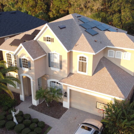 Clermont solar energy system on the roof of a two story home in Clermont, FL installed by Solcium Solar